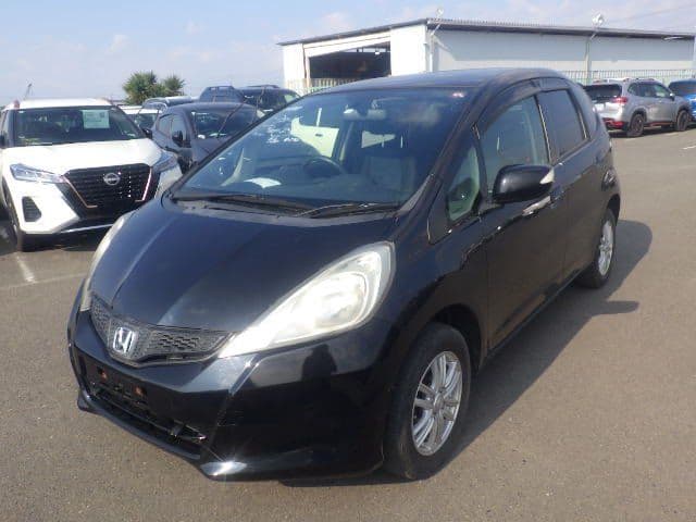
								2011 HONDA FIT 13G
							