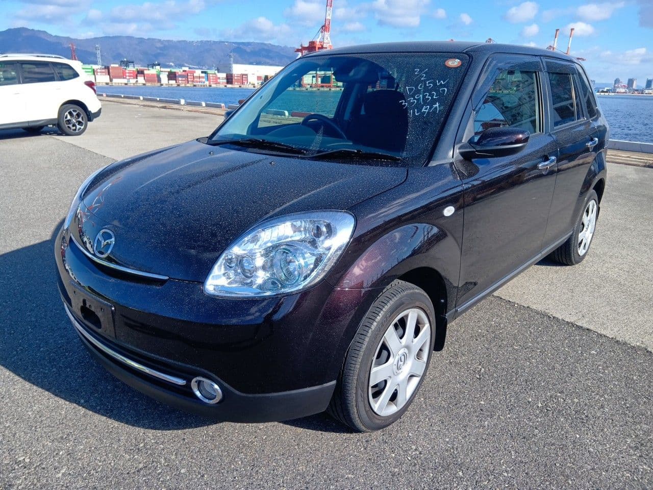 
									2010 MAZDA VERISA C
								